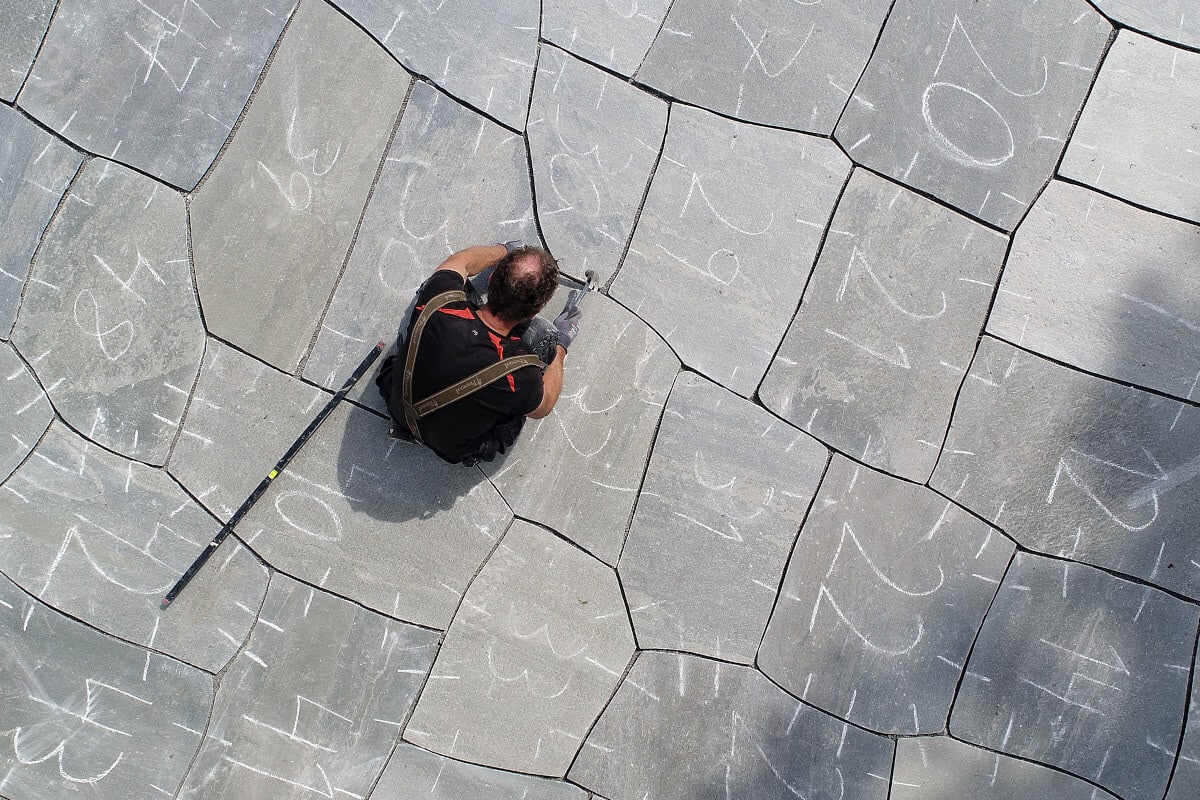 Prefabricated flagstones being installed